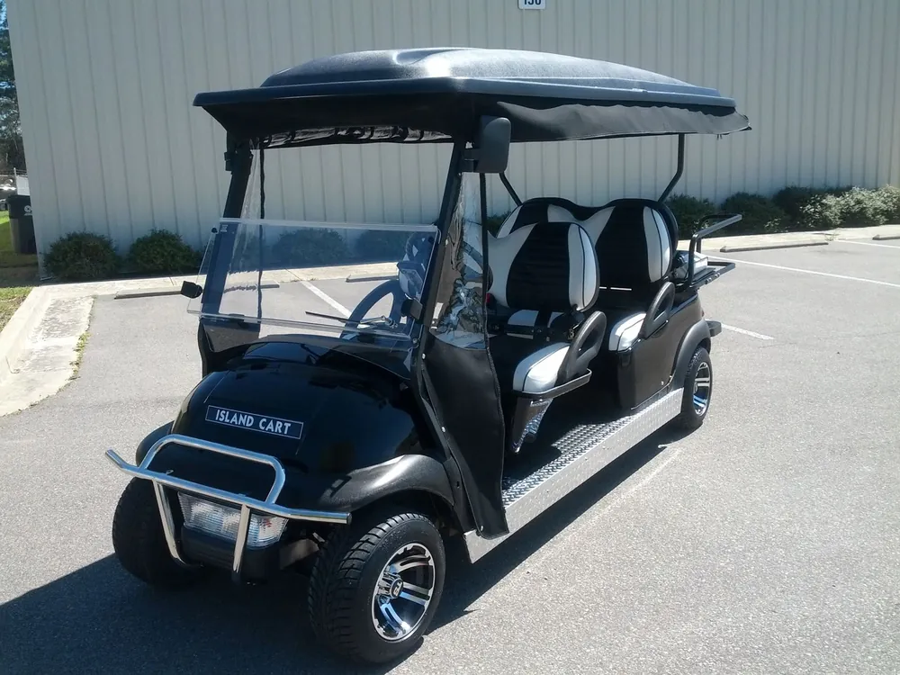 Black 6-passenger limo Island Cart rental with black-and-white seats